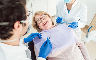 Woman smiling in the dental chair